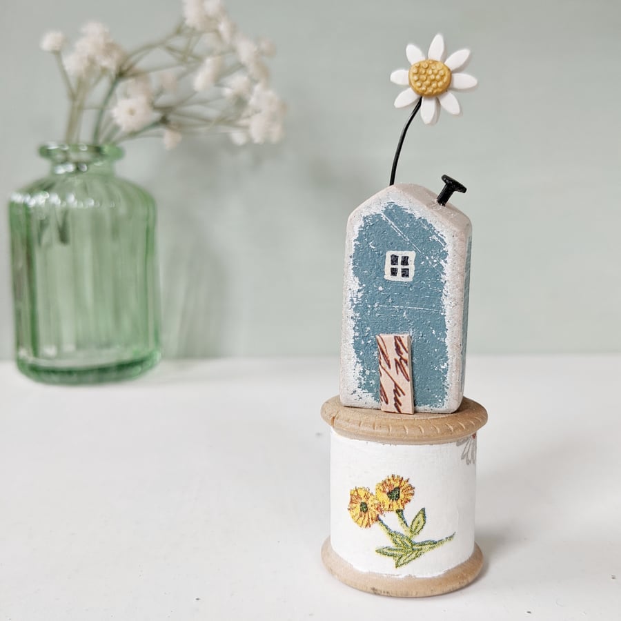 Wooden House on a Vintage Floral Bobbin with Clay Daisy