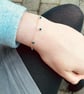 9ct gold bracelet with small faceted sapphire charms - Image 2