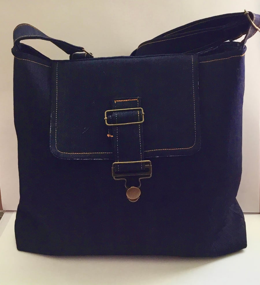 Denim satchel style crossbody bag.