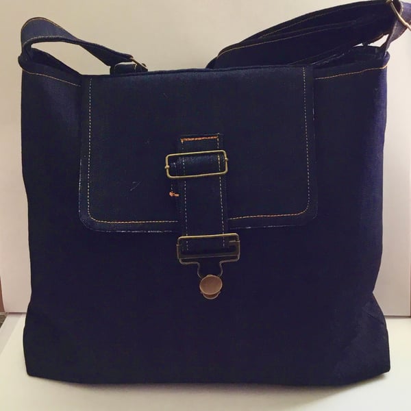 Denim satchel style crossbody bag.