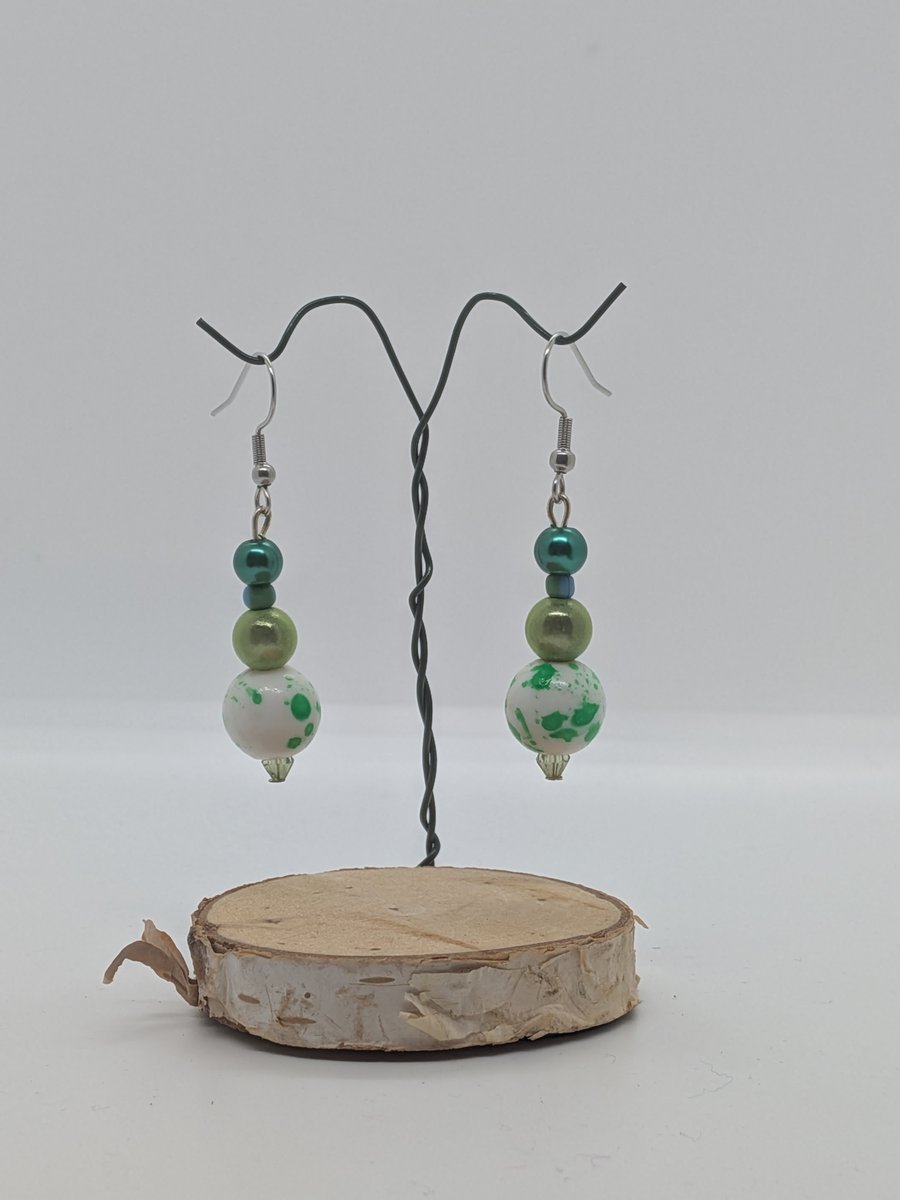 Green bead dangle earrings