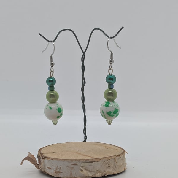 Green bead dangle earrings
