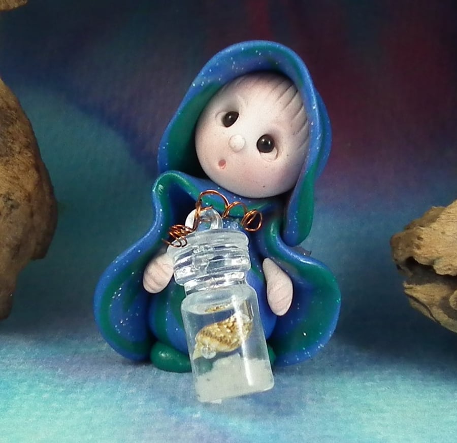 Sale Tiny Beachcomber Gnome 'Enola' with shell in jar OOAK Sculpt by Ann Galvin