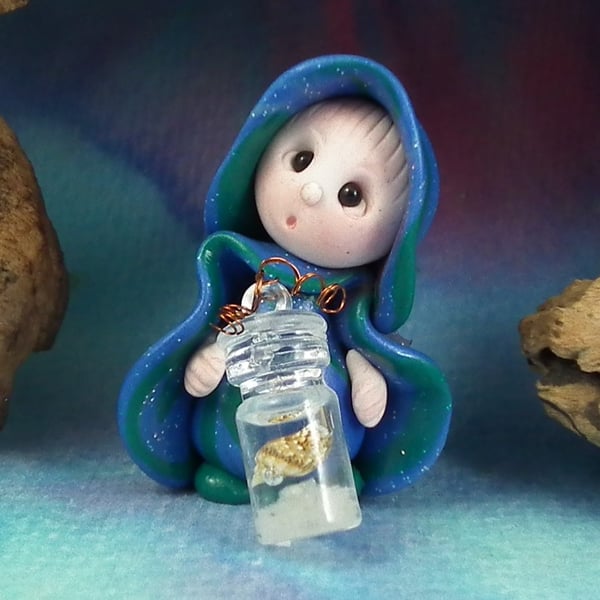 Sale Tiny Beachcomber Gnome 'Enola' with shell in jar OOAK Sculpt by Ann Galvin