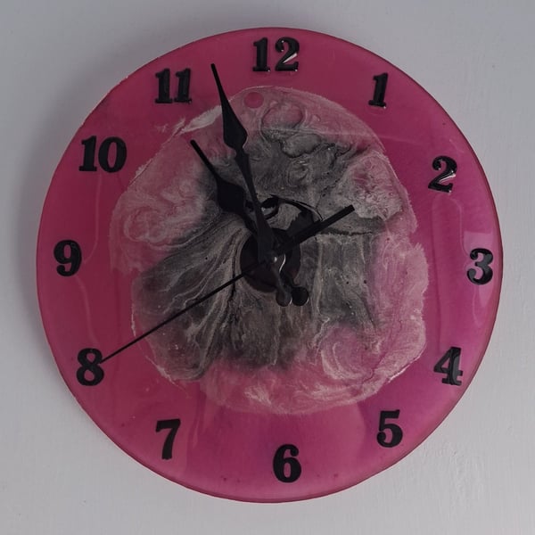 Handmade epoxy resin clock with hanger. Battery operated.