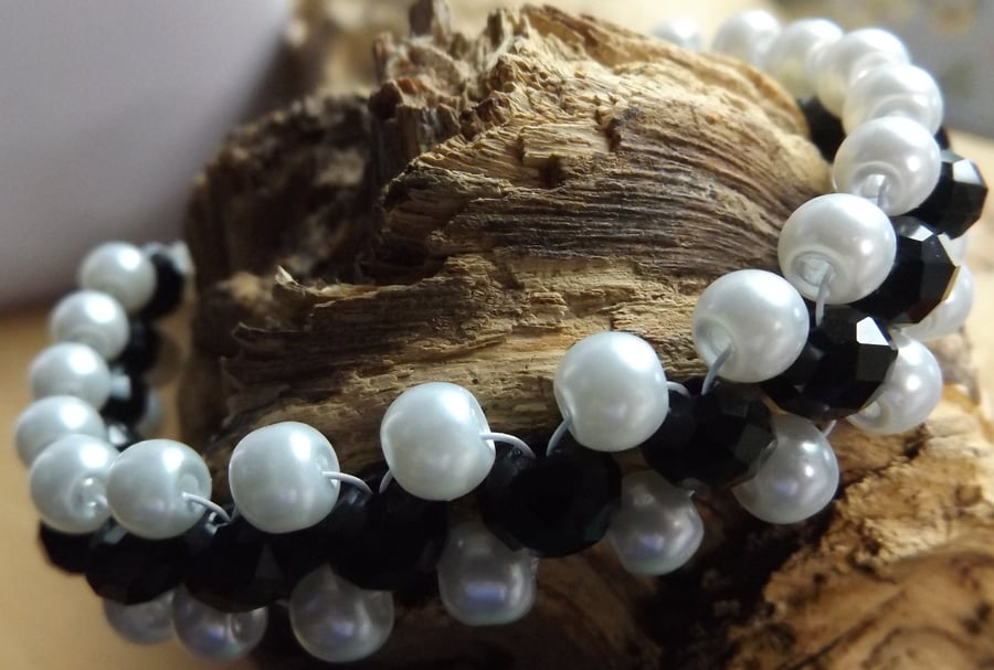 white glass pearl with black crystal bracelet
