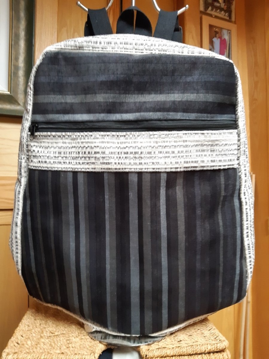 Grey striped velvet backpack