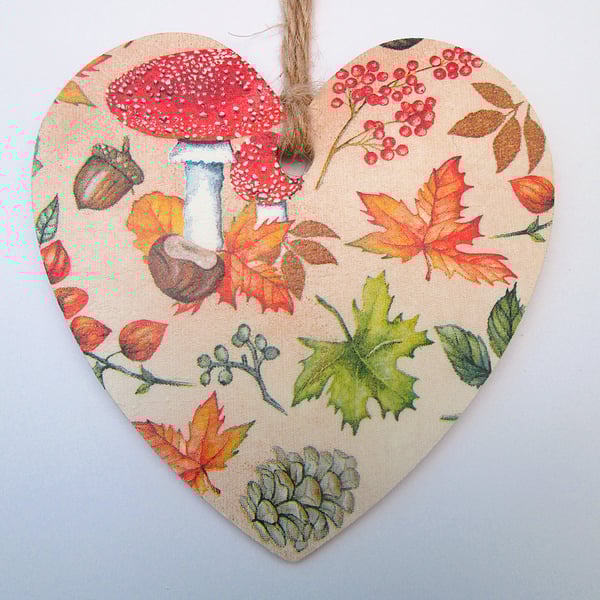 Autumn leaves and fungi wood decoupage heart hanging decoration