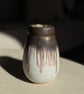Handmade bronze and matte white glazed stoneware ceramic vase for flowers