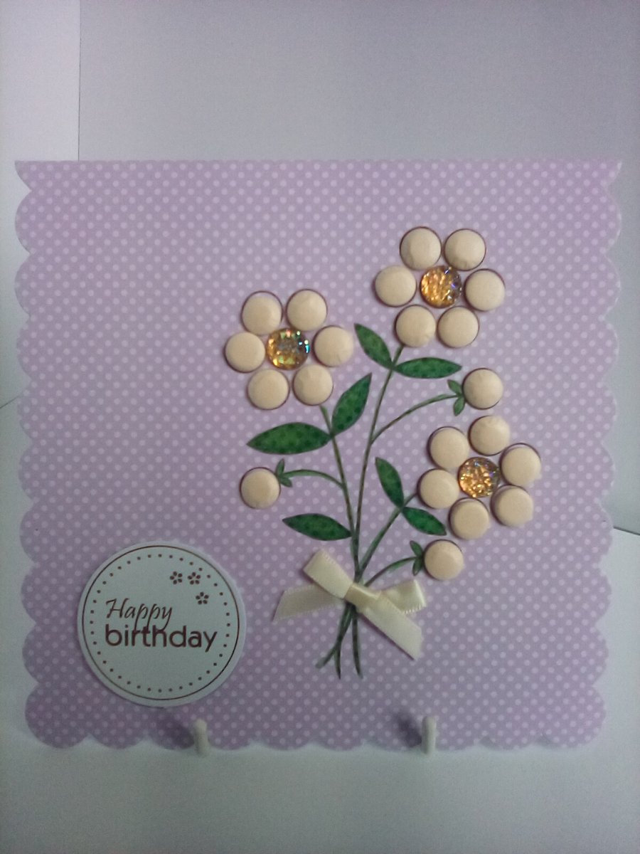 Watercolour and embellished bunch of flowers birthday card, with ribbon bow.