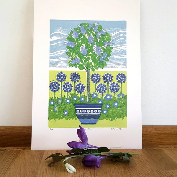 linoprint of springtime flowers.  Lilac Time Garden linocut