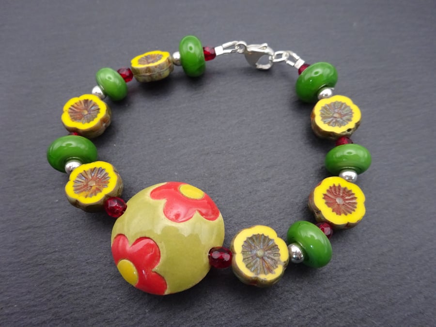 lampwork glass bracelet, green and yellow ceramic focal