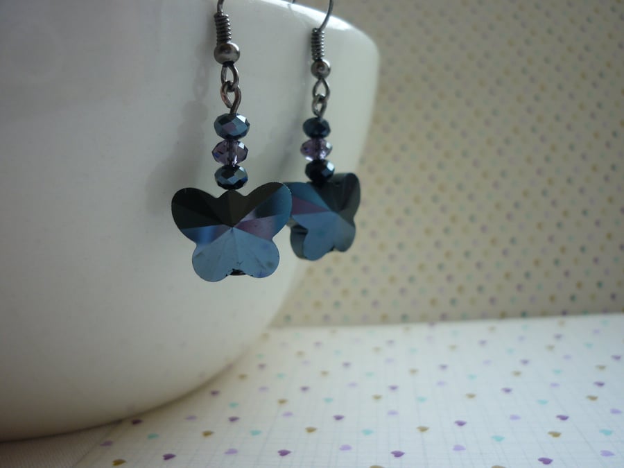 HEMATITE & DARK LILAC BUTTERFLY EARRINGS.  1064