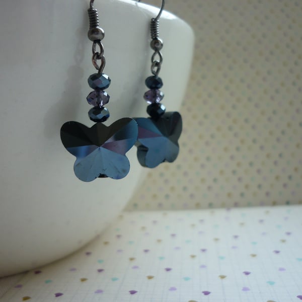 HEMATITE & DARK LILAC BUTTERFLY EARRINGS.  1064