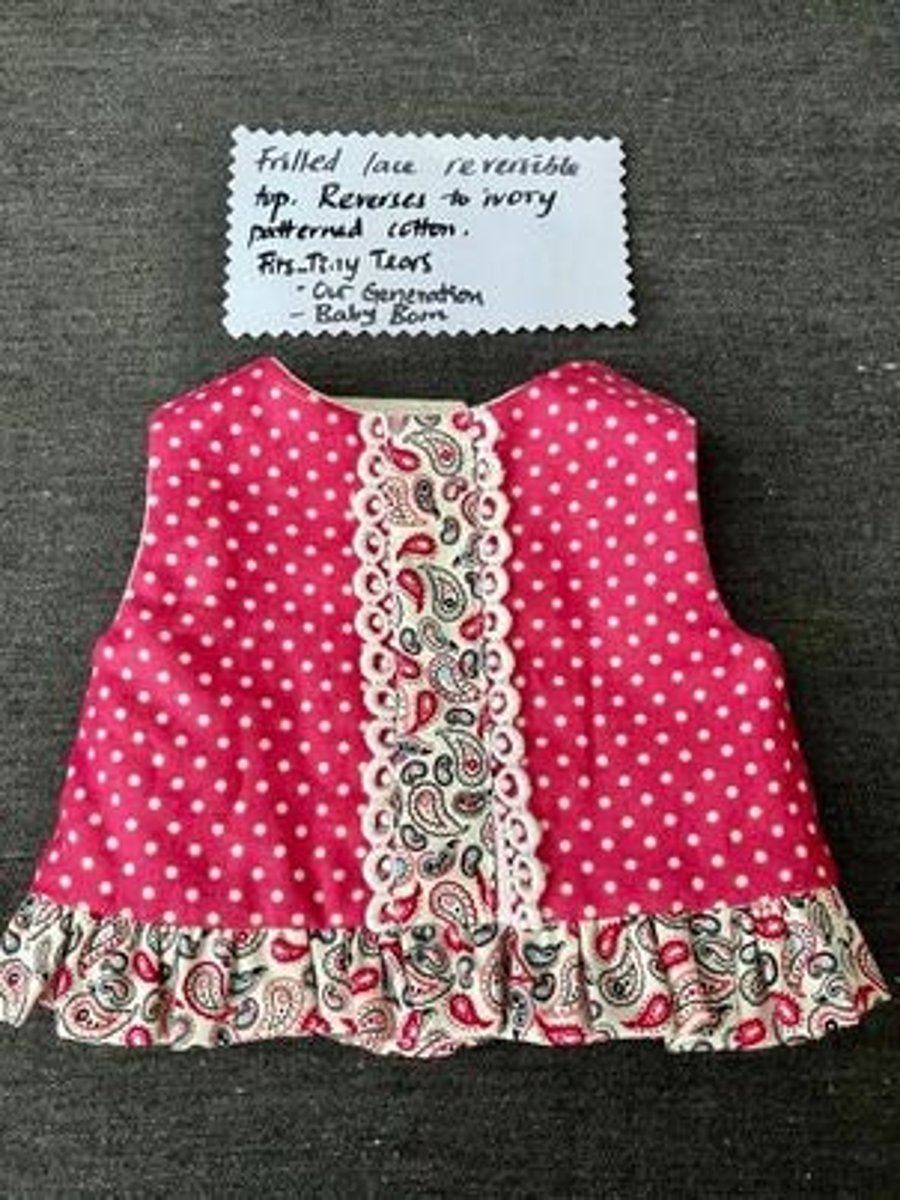 Frills and lace make this a beautiful little top for your doll
