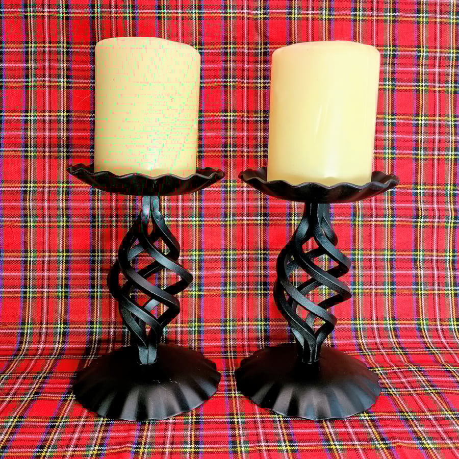 Pair of black blacksmith made candlesticks