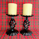Pair of black blacksmith made candlesticks
