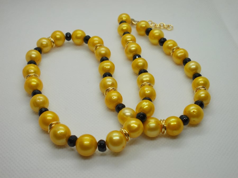 Golden freshwater cultured pearl and black agate necklace
