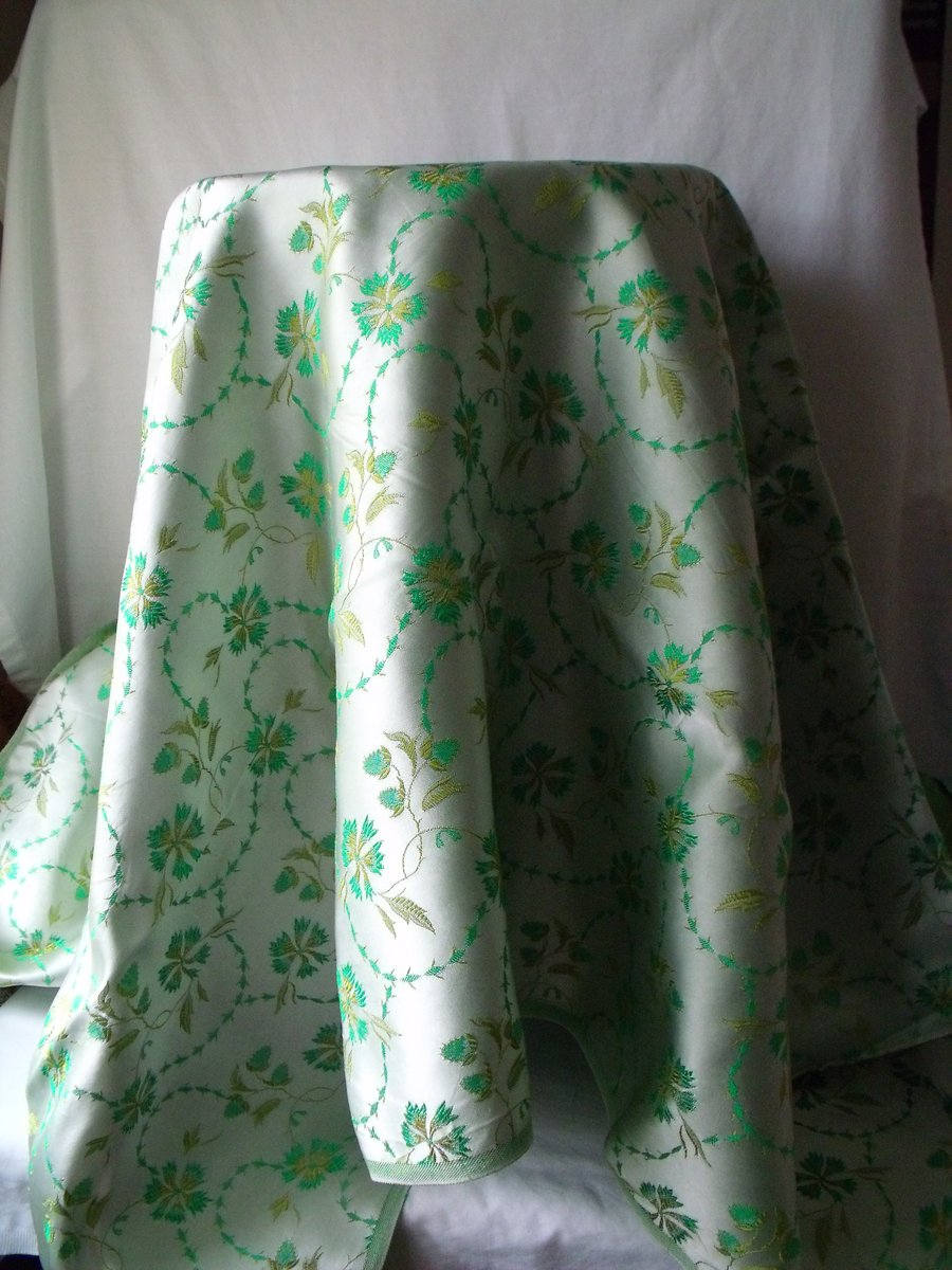  oriental style satin fabric for dressmaking or textile student, green