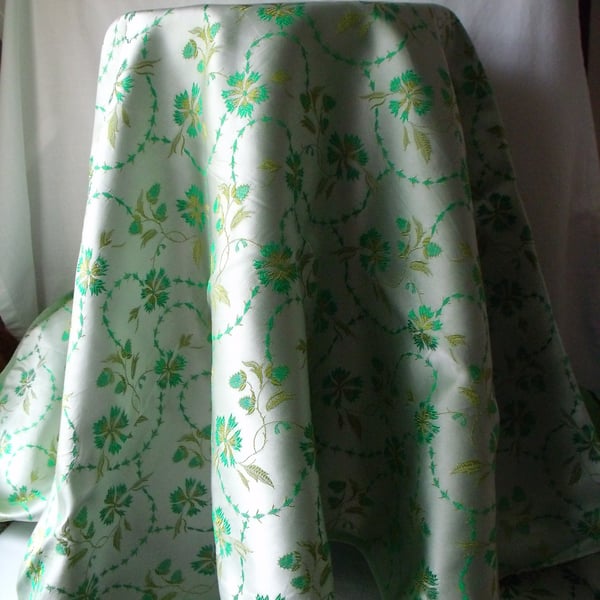  oriental style satin fabric for dressmaking or textile student, green