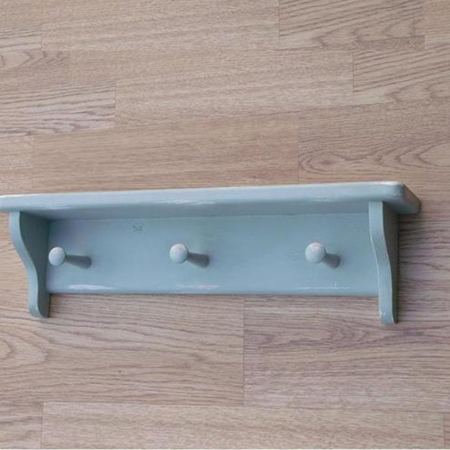 Aged peg rack and shelf