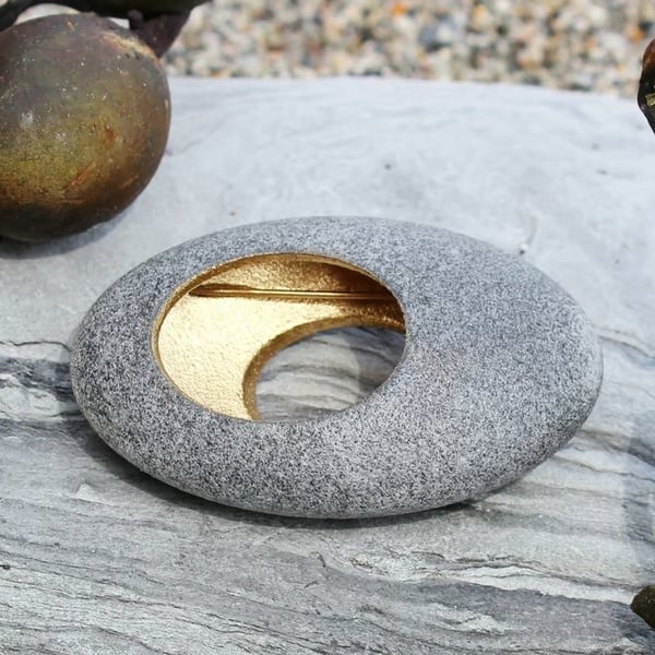 Pebble brooch, nature inspired with a golden hollow centre. A John Field design