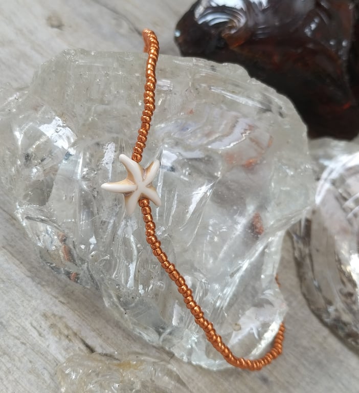 Orange beaded anklet with starfish