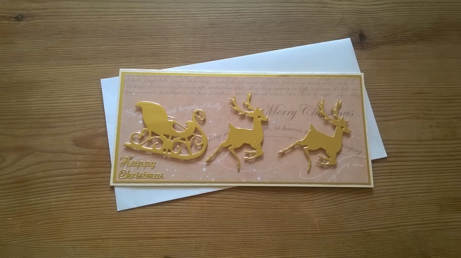 Gold Christmas reindeers with sled card
