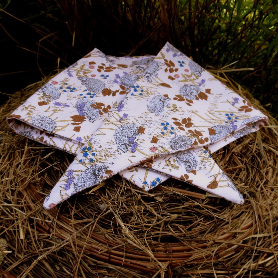 A dog bandana.  Size small to medium.  56cm x 19.5cm.
