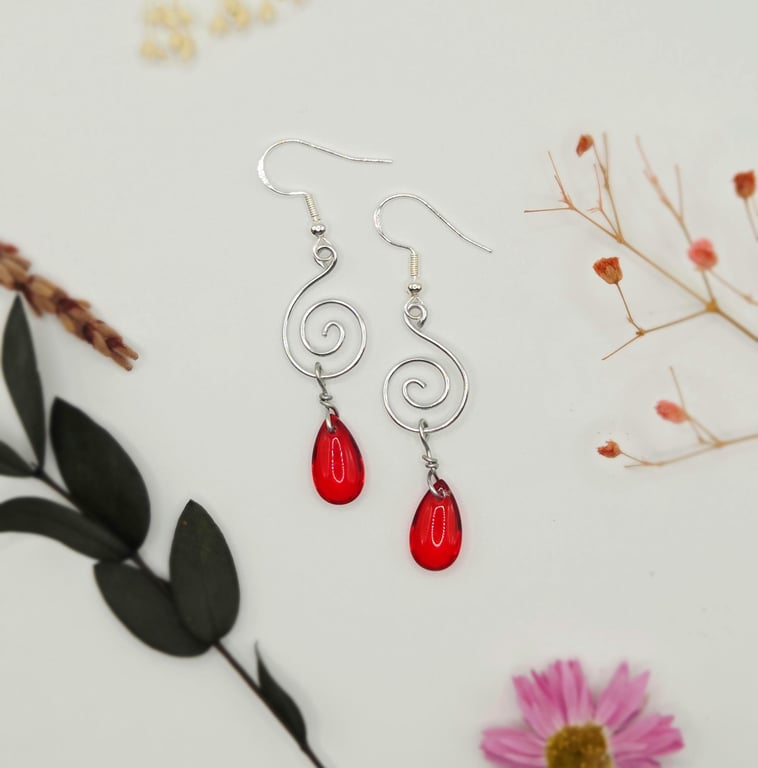 Sterling silver spiral wire dangle earrings with red briolette glass beads
