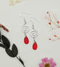 Sterling silver spiral wire dangle earrings with red briolette glass beads