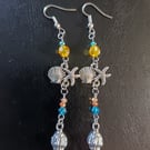 Silver beaded dangle earrings with shell charms 