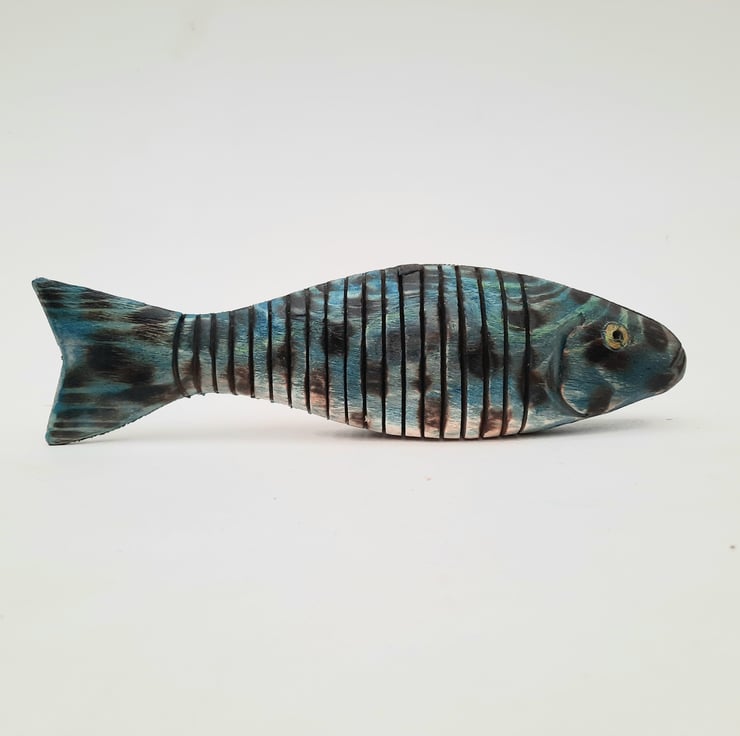 Articulating fish Folksy