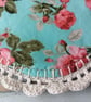 Set of four handmade floral coasters with crochet edge. - Image 4
