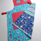 Kids Aprons - Red Riding Hood reversing to gnomes on an egg hunt