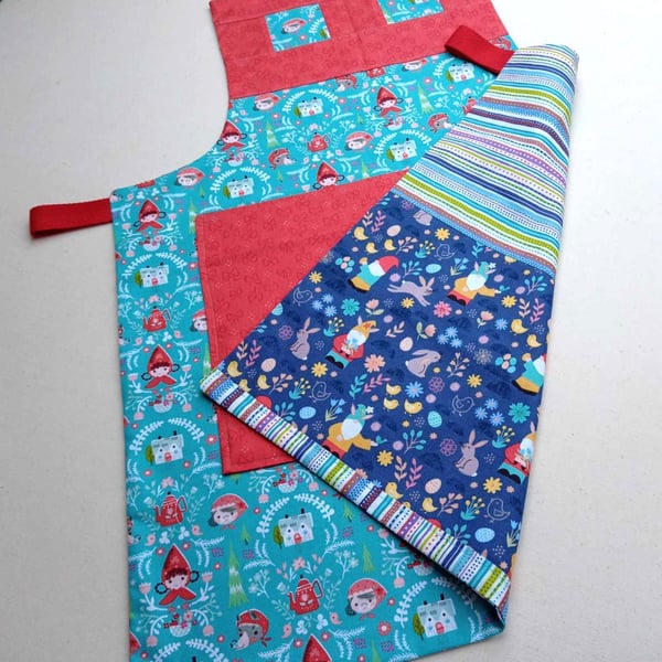 Kids Aprons - Red Riding Hood reversing to gnomes on an egg hunt