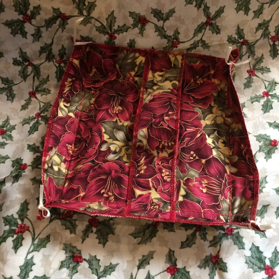 Decorative red floral and white and holly square fabric basket