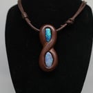 Opal infinity loop wooden pendant.