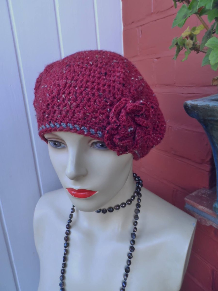 Crochet cloche hat in rich red and grey marl wool mix yarns. Removable corsage.