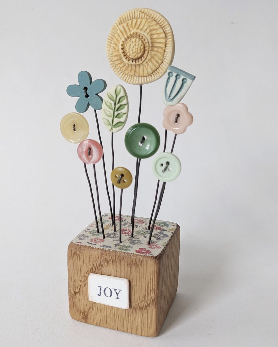 Clay Flower and Button Garden in a Wood Block 'Joy'
