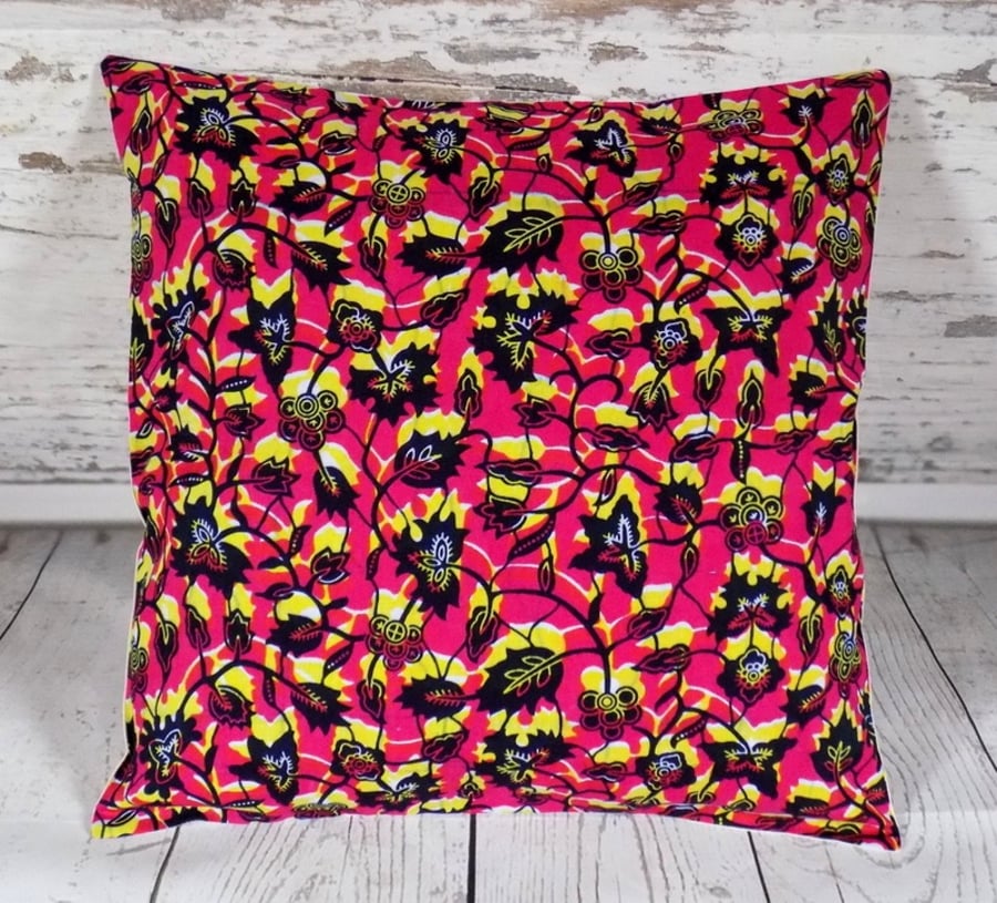 Cushion cover. African wax print, indigo and yellow on magenta pink