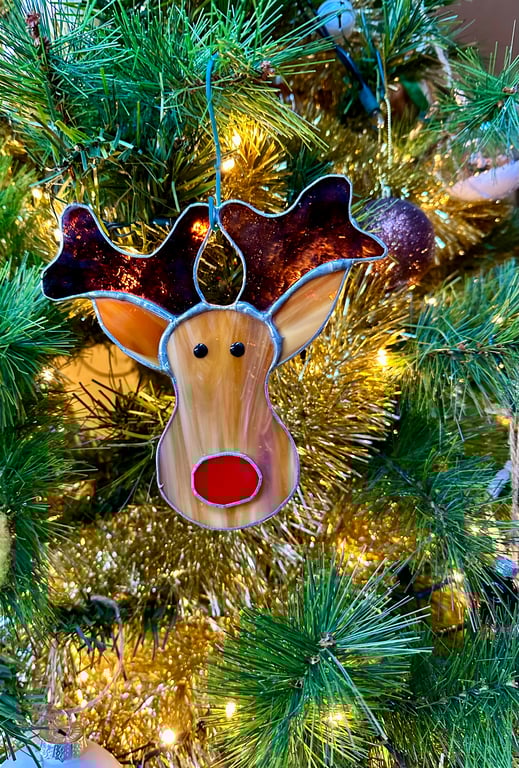 Stained glass reindeer suncatcher decoration in caramel with red nose