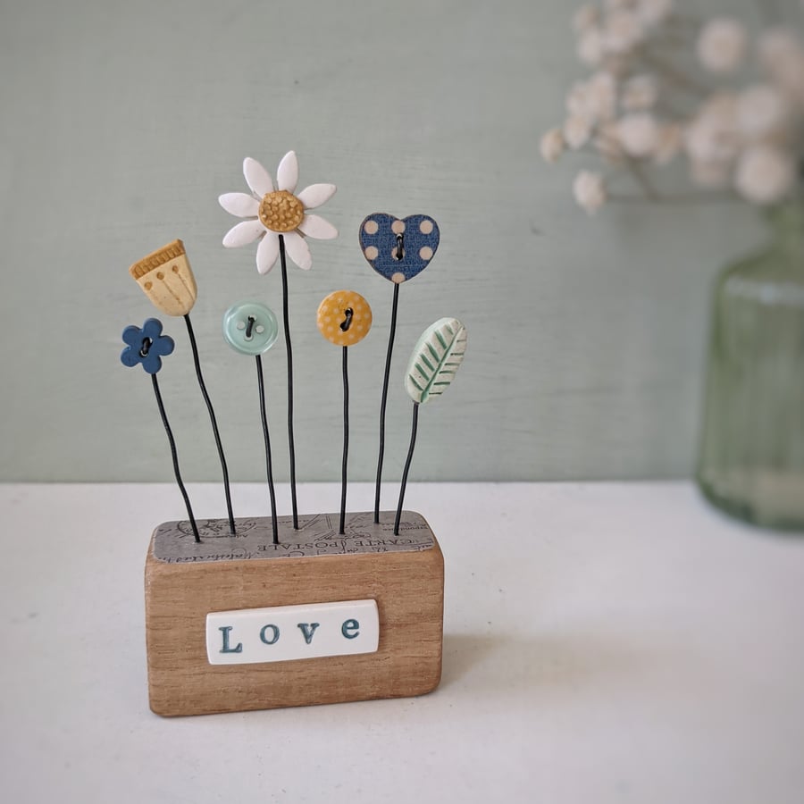 Clay and Button Flower Garden in a Wood Block 'Love'