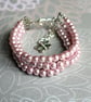 Pink Glass Pearl Three Strand Bracelet - Image 1