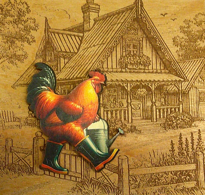 Chicken working in the garden. Wear as a brooch. Made of lightweight wood.