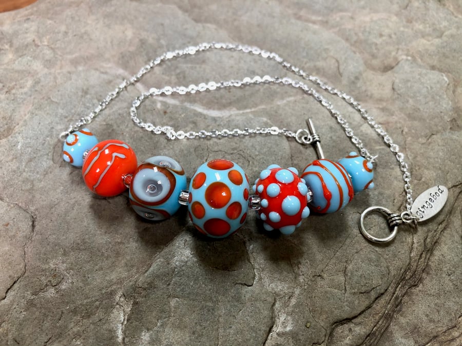 Turquoise blue and orange lampwork glass beaded necklace handmade 