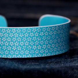 Star pattern aluminium cuff turquoise