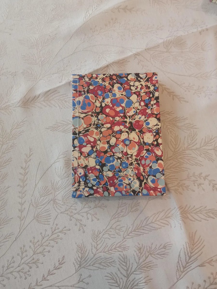 Neutral tones sketchbook hand sewn with linen thread. Artist Journal