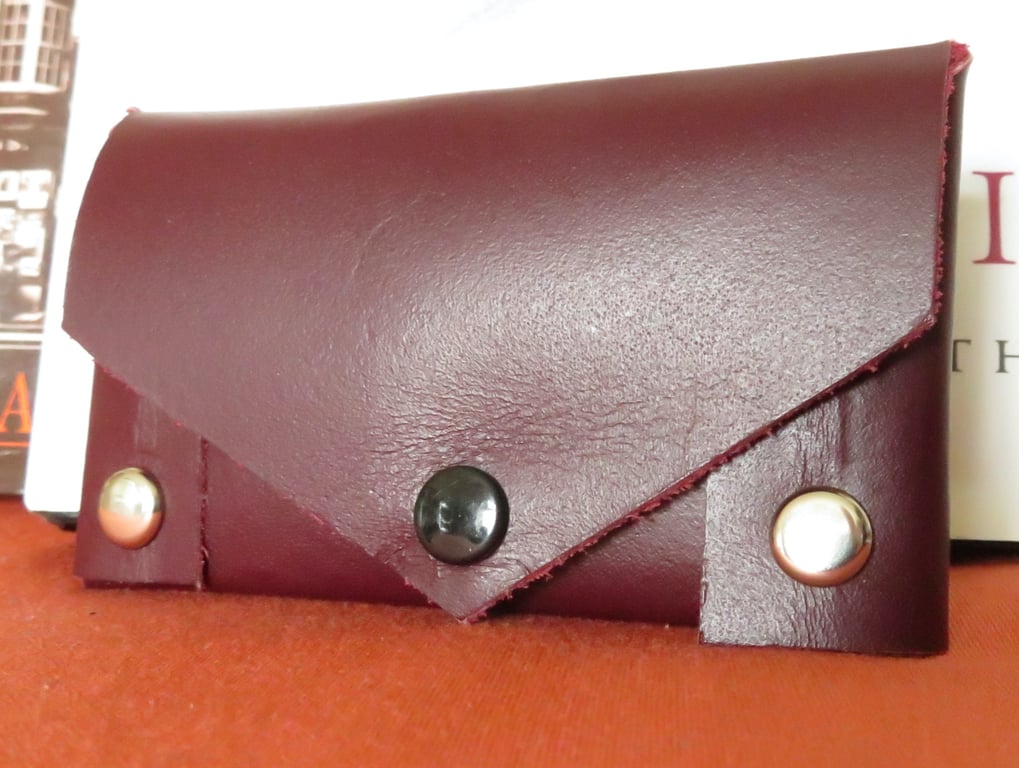 Small leather studded key case to slip into your pocket.