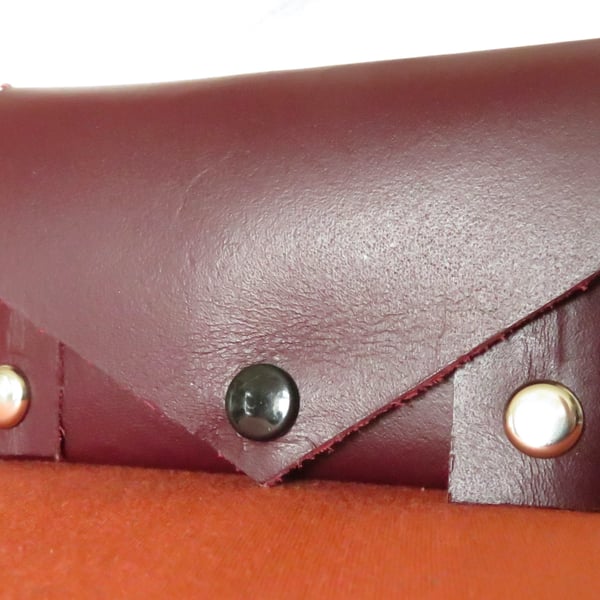 Small leather studded key case to slip into your pocket.